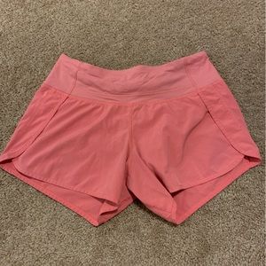 Lululemon pink speed up mid rise shorts